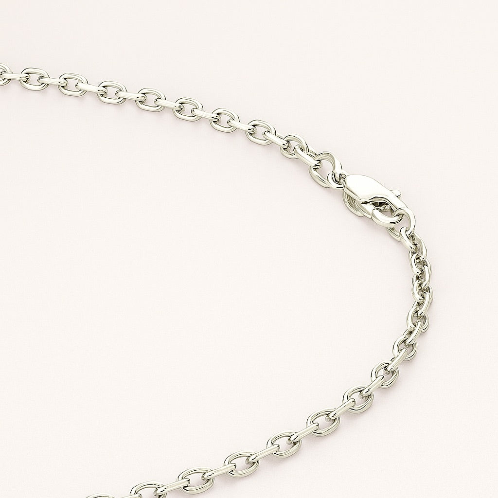 Silver chain bracelet on a white background